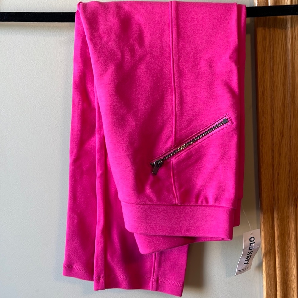 Girls pink , stretchable regular pants.